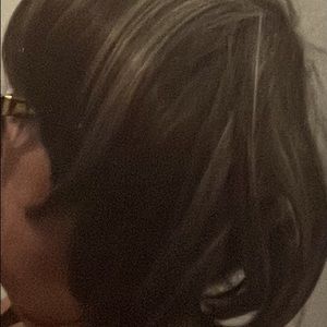 Synthetic wig in dark brown with silver highlights